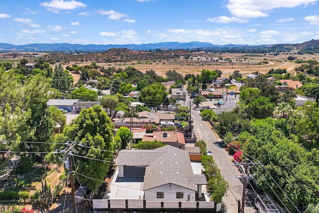 drone / aerial view featuring a mountain view