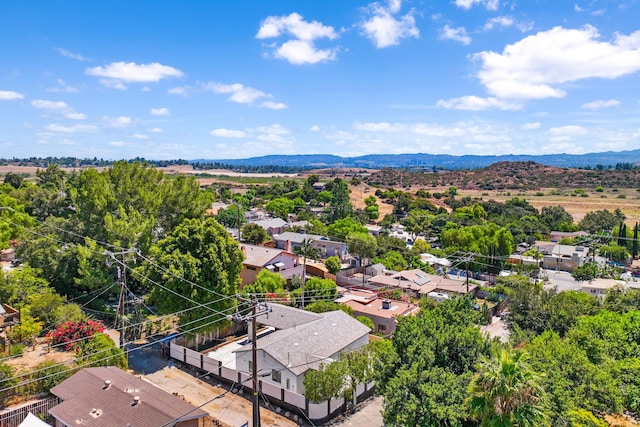 birds eye view of property featuring a mountain view