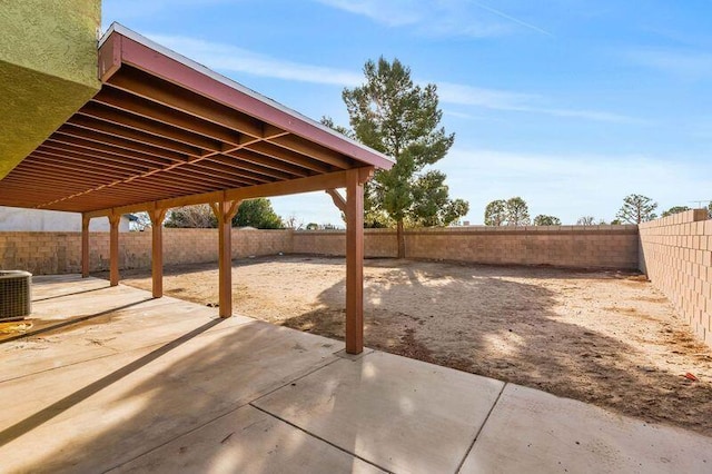 view of patio / terrace with a fenced backyard and central AC unit