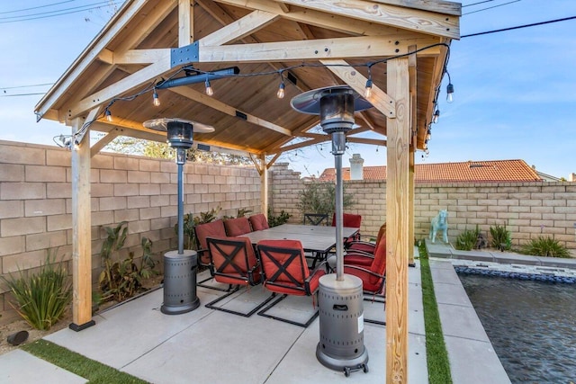 view of patio featuring a gazebo