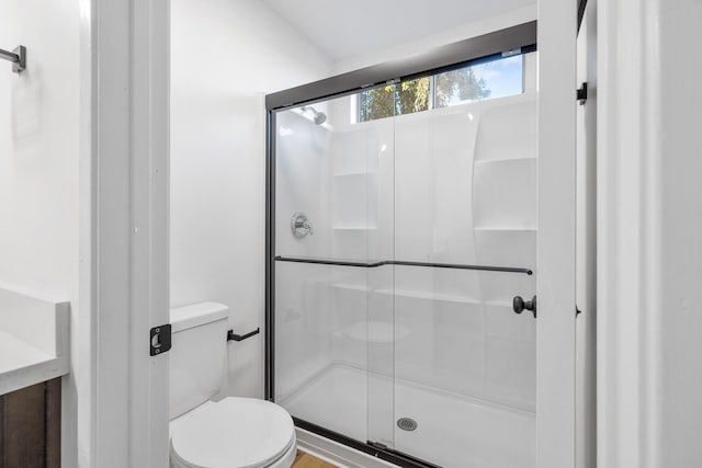 2203 Scott Ave, Palmdale, CA 93550 - bathroom featuring a stall shower and toilet