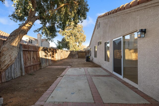 2203 Scott Ave, Palmdale, CA 93550 - exterior space with a fenced backyard and central AC