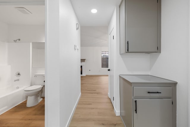 2203 Scott Ave, Palmdale, CA 93550 - hallway featuring baseboards, visible vents, and light wood-style floors