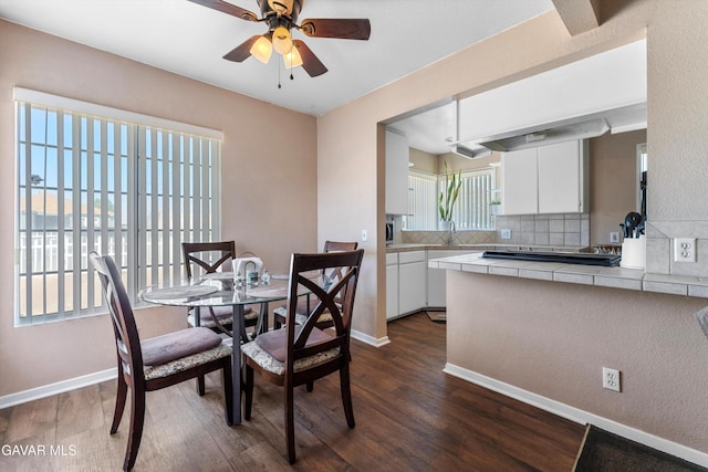 44344 Elm Ave, Lancaster, CA 93534 - dining space with ceiling fan and dark wood-style floors