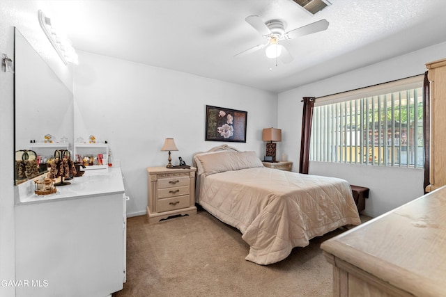 44344 Elm Ave, Lancaster, CA 93534 - bedroom with light carpet and ceiling fan
