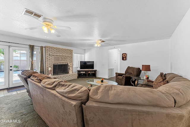 44344 Elm Ave, Lancaster, CA 93534 - living room with a ceiling fan, french doors, tile patterned floors, and a textured ceiling