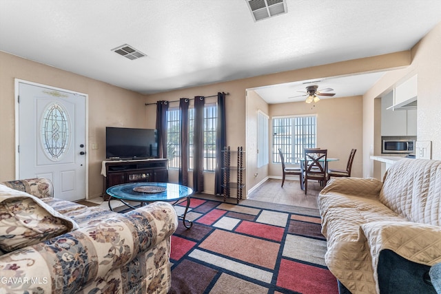 44344 Elm Ave, Lancaster, CA 93534 - living area with a ceiling fan and baseboards