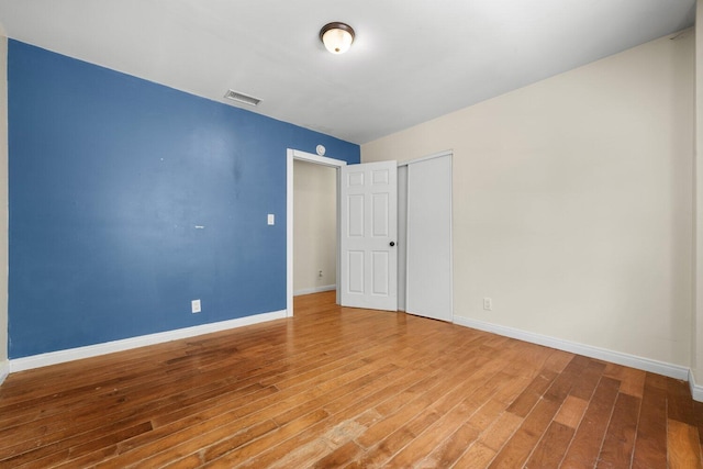 13113 Johnson Rd, Lake Hughes, CA 93532 - spare room featuring wood-type flooring
