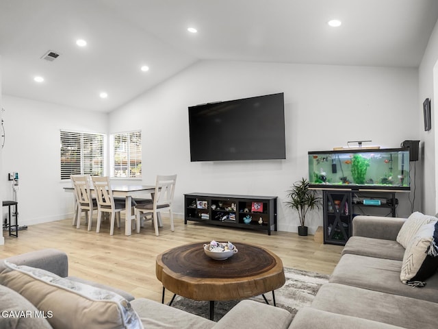 1324 Windermere Ct, Palmdale, CA 93551 - living room with wood finished floors, lofted ceiling, and recessed lighting