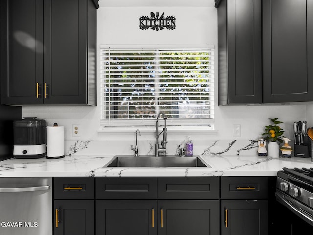 1324 Windermere Ct, Palmdale, CA 93551 - kitchen with stainless steel dishwasher and light stone counters