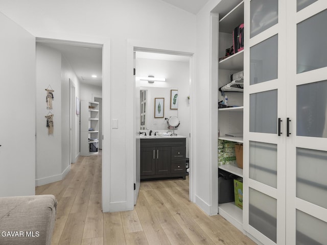 1324 Windermere Ct, Palmdale, CA 93551 - hall featuring light wood-style floors and recessed lighting