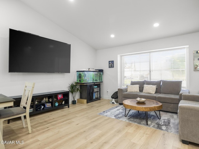 1324 Windermere Ct, Palmdale, CA 93551 - living room with wood finished floors, lofted ceiling, and recessed lighting