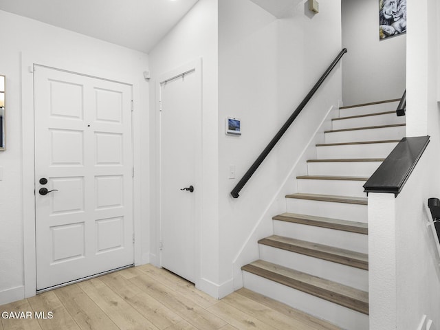 1324 Windermere Ct, Palmdale, CA 93551 - foyer entrance with wood finished floors and stairway