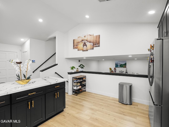 1324 Windermere Ct, Palmdale, CA 93551 - bar area with freestanding refrigerator, light wood-style floors, recessed lighting, and vaulted ceiling
