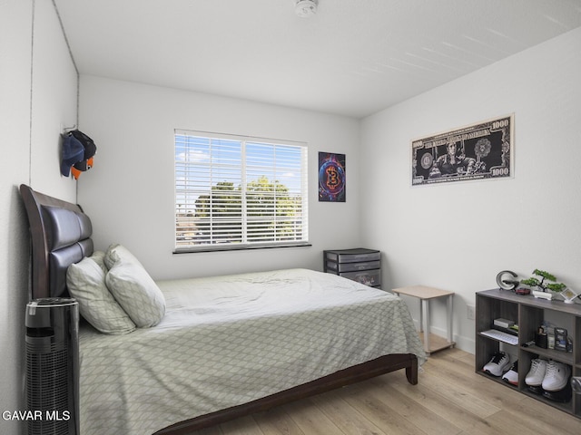 1324 Windermere Ct, Palmdale, CA 93551 - bedroom featuring wood finished floors and baseboards