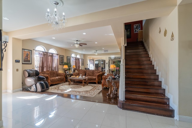 40947 Ridgegate Ln, Palmdale, CA 93551 - interior space featuring ceiling fan with notable chandelier, baseboards, tile patterned flooring, and recessed lighting