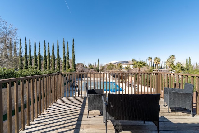 40947 Ridgegate Ln, Palmdale, CA 93551 - wooden terrace featuring a fenced in pool