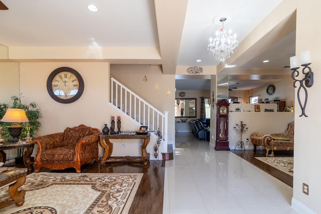 40947 Ridgegate Ln, Palmdale, CA 93551 - tiled entrance foyer with stairs, an inviting chandelier, beamed ceiling, baseboards, and recessed lighting
