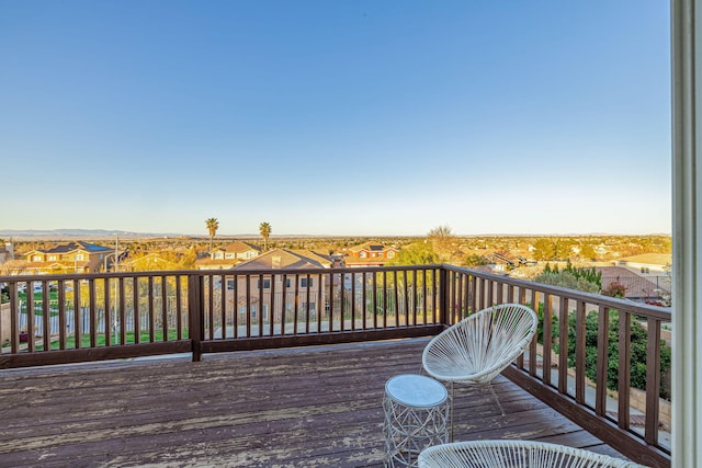 deck with a residential view and central AC unit