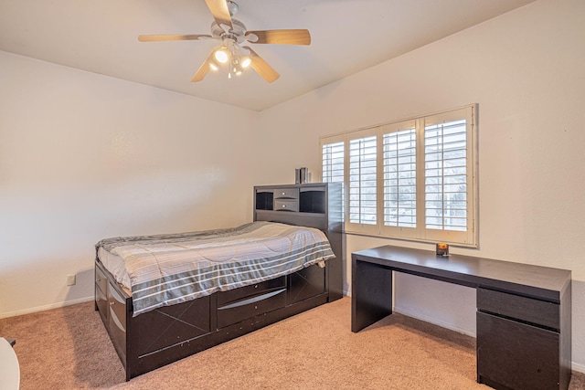 carpeted bedroom with baseboards and ceiling fan