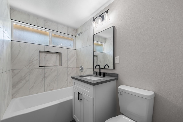 44510 W 21st St, Lancaster, CA 93536 - full bath with plenty of natural light, toilet, shower / bathtub combination, vanity, and a textured wall