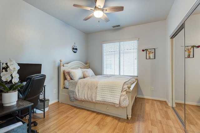 28097 Promontory Ln, Valencia, CA 91354 - bedroom with light wood finished floors, baseboards, an office area, and a ceiling fan