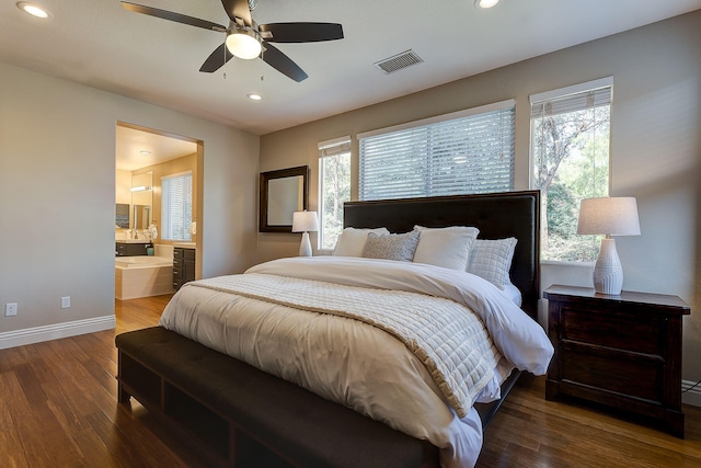 28097 Promontory Ln, Valencia, CA 91354 - bedroom with multiple windows, wood finished floors, baseboards, recessed lighting, and ensuite bathroom