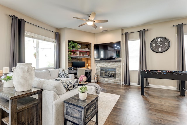 28097 Promontory Ln, Valencia, CA 91354 - living area featuring a ceiling fan, wood-type flooring, a fireplace, baseboards, and recessed lighting