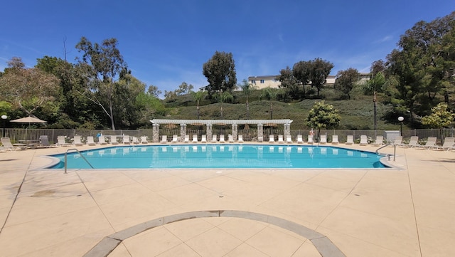 28097 Promontory Ln, Valencia, CA 91354 - community pool featuring a patio