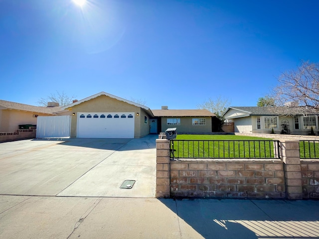 429 Peg St, Ridgecrest, CA 93555 - ranch-style house featuring a fenced front yard, an attached garage, driveway, and stucco siding