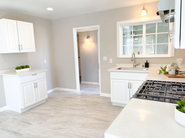 429 Peg St, Ridgecrest, CA 93555 - kitchen featuring light countertops, white cabinetry, and recessed lighting
