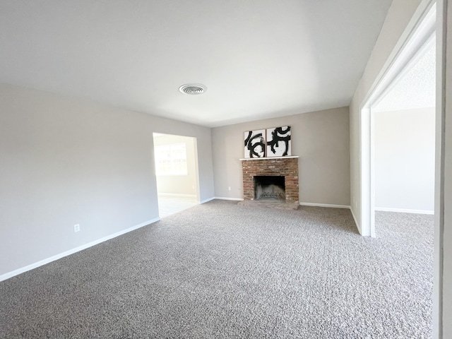 429 Peg St, Ridgecrest, CA 93555 - unfurnished living room with carpet flooring and a fireplace