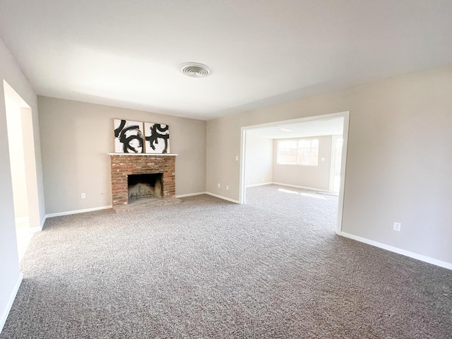 429 Peg St, Ridgecrest, CA 93555 - unfurnished living room with carpet and a brick fireplace