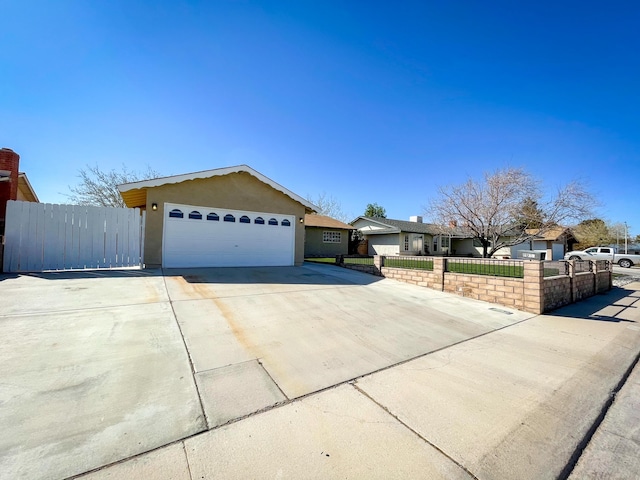 429 Peg St, Ridgecrest, CA 93555 - ranch-style home featuring a fenced front yard, concrete driveway, stucco siding, and an attached garage