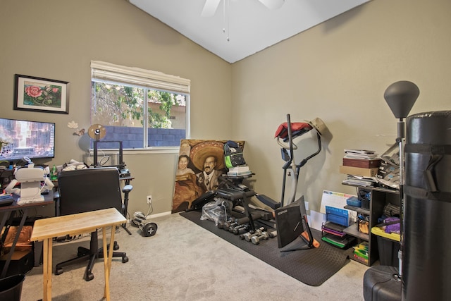 office featuring ceiling fan, light colored carpet, and vaulted ceiling