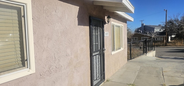 view of side of home with a patio