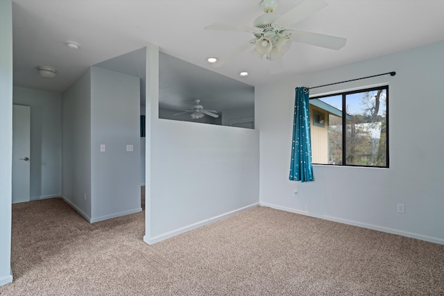 unfurnished room featuring baseboards, carpet, a ceiling fan, and recessed lighting