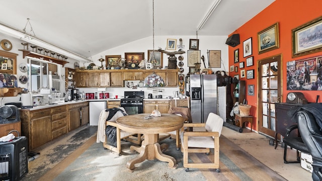 kitchen with light countertops, stainless steel fridge, black range with gas stovetop, unfinished concrete flooring, and dishwashing machine
