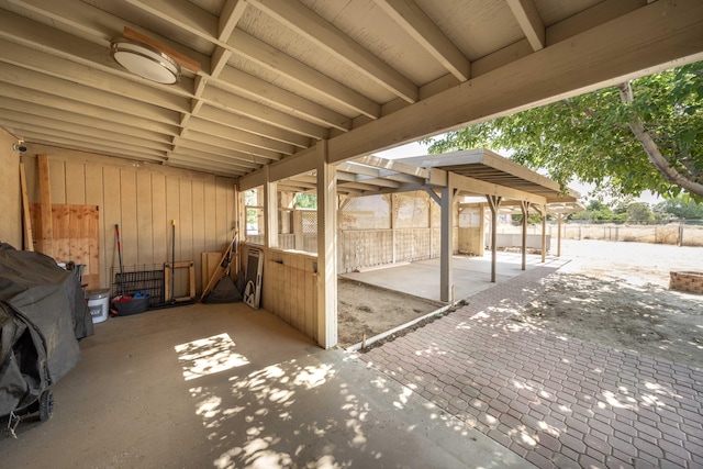 view of patio with an outbuilding