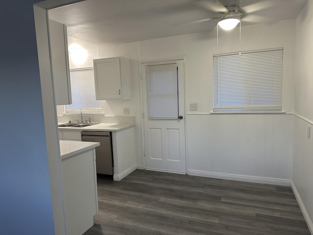 15284 Carol St, Mojave, CA 93501 - kitchen with a sink, stainless steel dishwasher, a ceiling fan, light countertops, and dark wood-style flooring