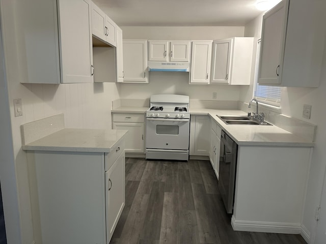 15284 Carol St, Mojave, CA 93501 - kitchen with white gas range, under cabinet range hood, a sink, dishwashing machine, and dark wood-type flooring