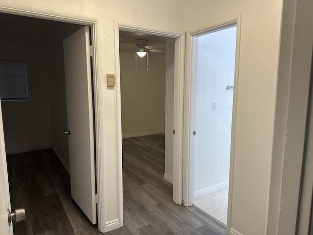 15284 Carol St, Mojave, CA 93501 - corridor with wood finished floors and baseboards