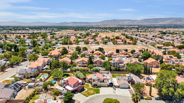 3628 Marilynn St, Lancaster, CA 93536 - aerial perspective of suburban area featuring a mountain backdrop