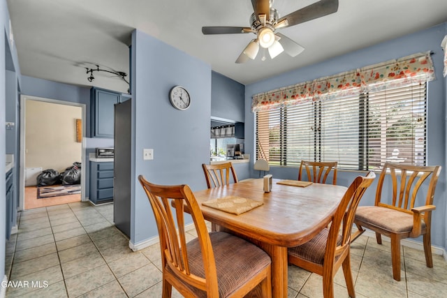 3628 Marilynn St, Lancaster, CA 93536 - dining room with light tile patterned floors and a ceiling fan