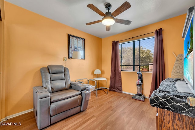 3628 Marilynn St, Lancaster, CA 93536 - sitting room with light wood-style floors and ceiling fan