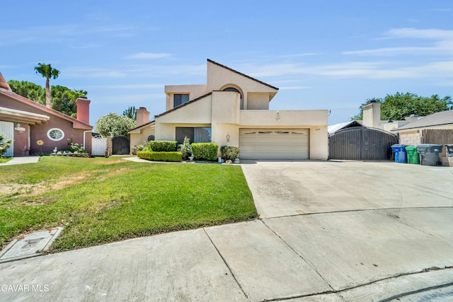 3628 Marilynn St, Lancaster, CA 93536 - view of front of property featuring a gate, a garage, concrete driveway, and stucco siding