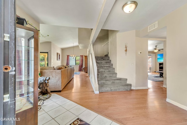 3628 Marilynn St, Lancaster, CA 93536 - foyer with stairs, a ceiling fan, wood finished floors, and lofted ceiling