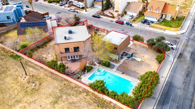 1510 W Newgrove St, Lancaster, CA 93534 - aerial perspective of suburban area featuring property boundaries highlighted and a pool
