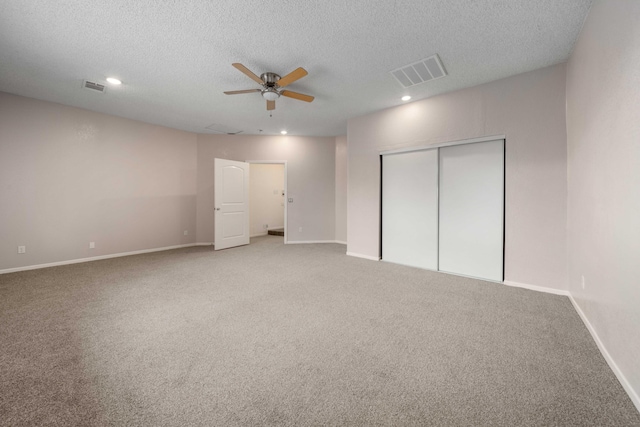 1510 W Newgrove St, Lancaster, CA 93534 - unfurnished bedroom featuring a textured ceiling, carpet, a closet, recessed lighting, and baseboards