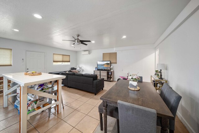 1510 W Newgrove St, Lancaster, CA 93534 - dining area featuring recessed lighting, ceiling fan, a wall mounted air conditioner, and light tile patterned floors